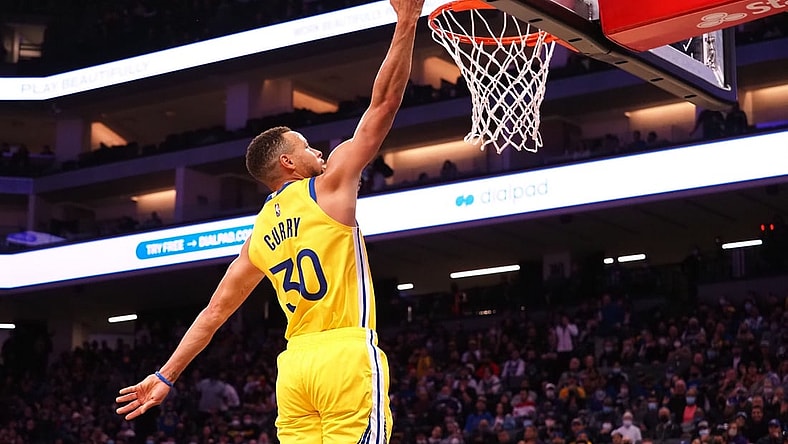 Oct 24, 2021; Sacramento, California, USA; Golden State Warriors guard Stephen Curry (30) goes up for the layup against the Sacramento Kings] during the second quarter at Golden 1 Center. Mandatory Credit: Kelley L Cox-USA TODAY Sports