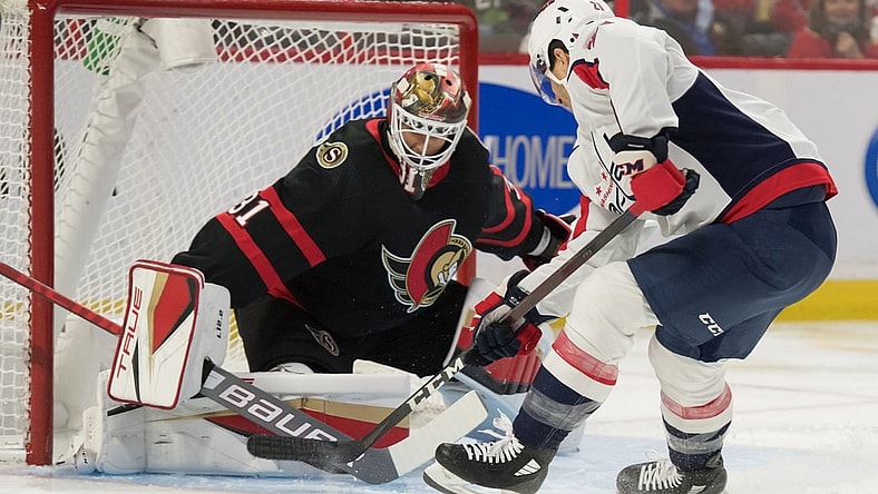 Oct 25, 2021; Ottawa, Ontario, CAN; Ottawa Senators goalie Anton Forsberg (31) makes a save on a shot from Washington Capitals right wing Garnet Hathaway (21) in the first period at the Canadian Tire Centre. Mandatory Credit: Marc DesRosiers-USA TODAY Sports