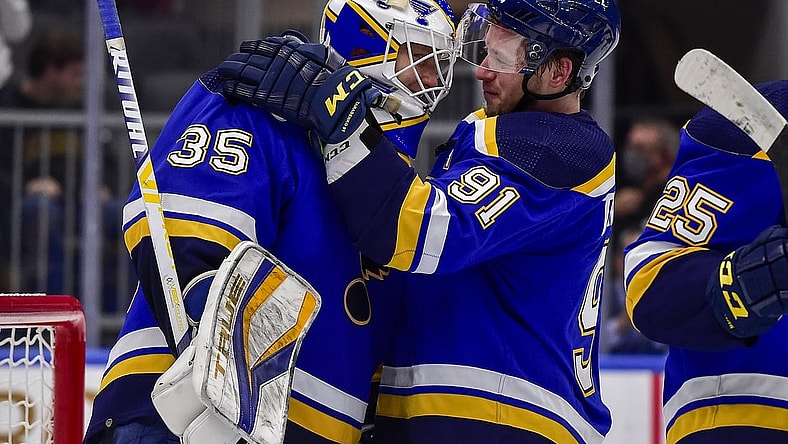Oct 25, 2021; St. Louis, Missouri, USA;  St. Louis Blues right wing Vladimir Tarasenko (91) celebrates with goaltender Ville Husso (35) after the Blues defeated the Los Angeles Kings at Enterprise Center. Mandatory Credit: Jeff Curry-USA TODAY Sports