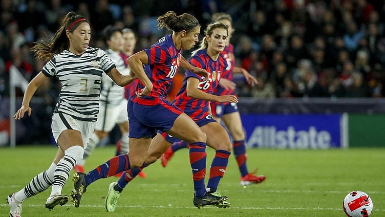 Oct 26, 2021; St. Paul, Minnesota, USA; United States forward Carli Lloyd (10) dribbles past South Korea defender Jeong Yeonga (3) in the first half of an international friendly soccer match at Allianz Field. Mandatory Credit: Bruce Kluckhohn-USA TODAY Sports