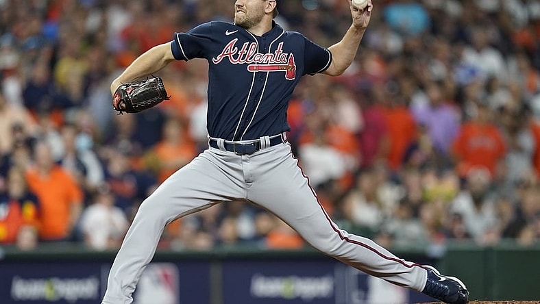 Oct 27, 2021; Houston, TX, USA; Atlanta Braves relief pitcher Dylan Lee throws a pitch against the Houston Astros during the sixth inning in game two of the 2021 World Series at Minute Maid Park. Mandatory Credit: Thomas Shea-USA TODAY Sports