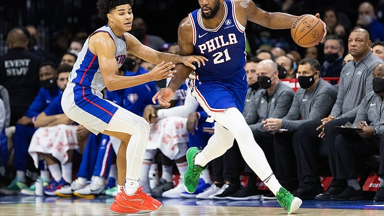 Oct 28, 2021; Philadelphia, Pennsylvania, USA; Philadelphia 76ers center Joel Embiid (21) dribbles past Detroit Pistons guard Killian Hayes (7) during the second quarter at Wells Fargo Center. Mandatory Credit: Bill Streicher-USA TODAY Sports