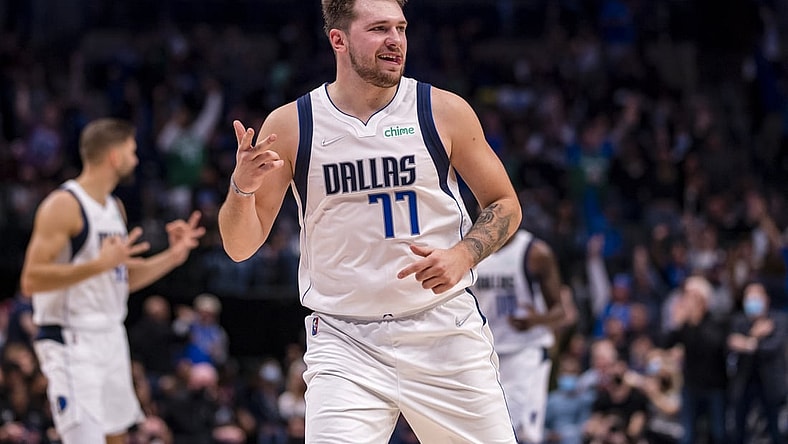 Oct 28, 2021; Dallas, Texas, USA; Dallas Mavericks guard Luka Doncic (77) celebrates making a three point shot against the San Antonio Spurs during the second half at the American Airlines Center. Mandatory Credit: Jerome Miron-USA TODAY Sports