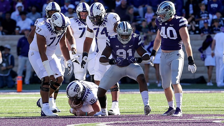 Oct 30, 2021; Manhattan, Kansas, USA; Kansas State Wildcats defensive end Felix Anudike-Uzomah (91) celebrates the sack of TCU Horned Frogs quarterback Max Duggan (15) during the first quarter at Bill Snyder Family Football Stadium. Mandatory Credit: Scott Sewell-USA TODAY Sports