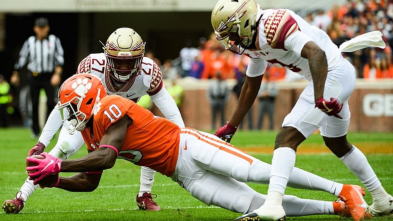 Clemson wide receiver Joseph Ngata (10) catches the ball during their game against Florida State at Memorial Stadium Saturday, Oct. 30, 2021.

Jm Clemson 103021 008