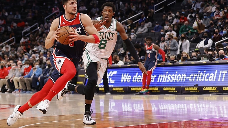 Oct 30, 2021; Washington, District of Columbia, USA; Washington Wizards forward Deni Avdija (9) drives to the basket as Boston Celtics guard Josh Richardson (8) defends during the first quarter at Capital One Arena. Mandatory Credit: Geoff Burke-USA TODAY Sports