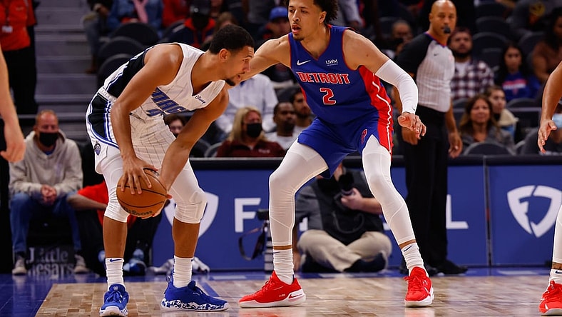 Oct 30, 2021; Detroit, Michigan, USA;  Detroit Pistons guard Cade Cunningham (2) defends Orlando Magic guard Jalen Suggs (4) in the first half at Little Caesars Arena. Mandatory Credit: Rick Osentoski-USA TODAY Sports