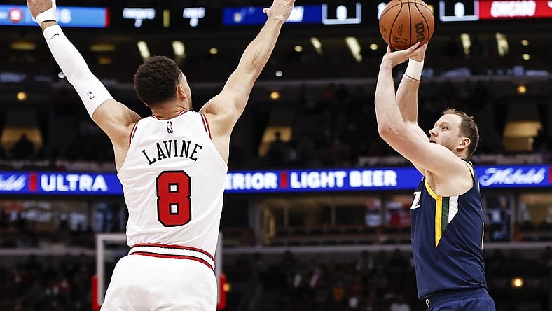 Oct 30, 2021; Chicago, Illinois, USA; Utah Jazz guard Joe Ingles (2) shoots against Chicago Bulls guard Zach LaVine (8) during the first half at United Center. Mandatory Credit: Kamil Krzaczynski-USA TODAY Sports