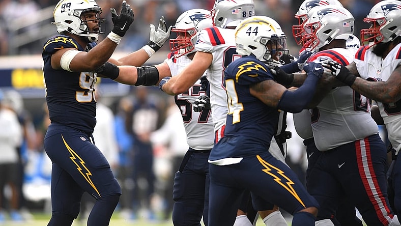 Oct 31, 2021; Inglewood, California, USA; Los Angeles Chargers defensive tackle Jerry Tillery (99) gestures towards the New England Patriots offense after a play in the first half at SoFi Stadium. Mandatory Credit: Orlando Ramirez-USA TODAY Sports