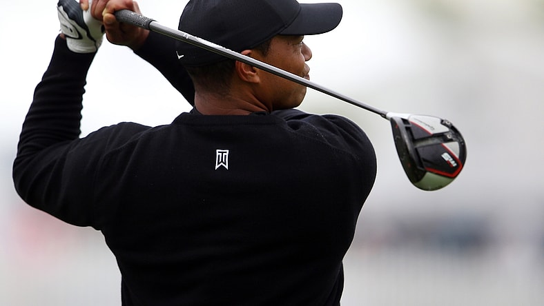 May 14, 2019; Farmingdale, NY, USA; Tiger Woods practices on the driving range for the PGA Championship golf tournament at Bethpage State Park - Black Course. Mandatory Credit: Peter Casey-USA TODAY Sports