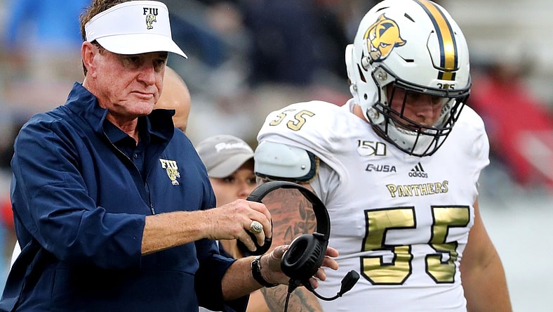 FIU head coach Butch Davis walks off the field with a hurt player FIU offensive lineman Shane McGough (55) during the game against MTSU on Saturday, Oct. 26, 2019, at MTSU.

37 Mtsu V Fiu