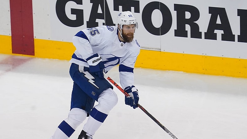 Aug 29, 2020; Toronto, Ontario, CAN; Tampa Bay Lightning defenseman Braydon Coburn (55) carries the puck against teh Boston Bruins in game four of the second round of the 2020 Stanley Cup Playoffs at Scotiabank Arena. Mandatory Credit: John E. Sokolowski-USA TODAY Sports