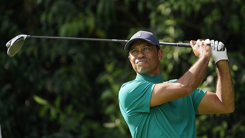 Nov 9, 2020; Augusta, Georgia, USA; Tiger Woods watch his hits his tee shot on the 14th hole during a practice round for The Masters golf tournament at Augusta National GC. Mandatory Credit: Michael Madrid-USA TODAY Sports