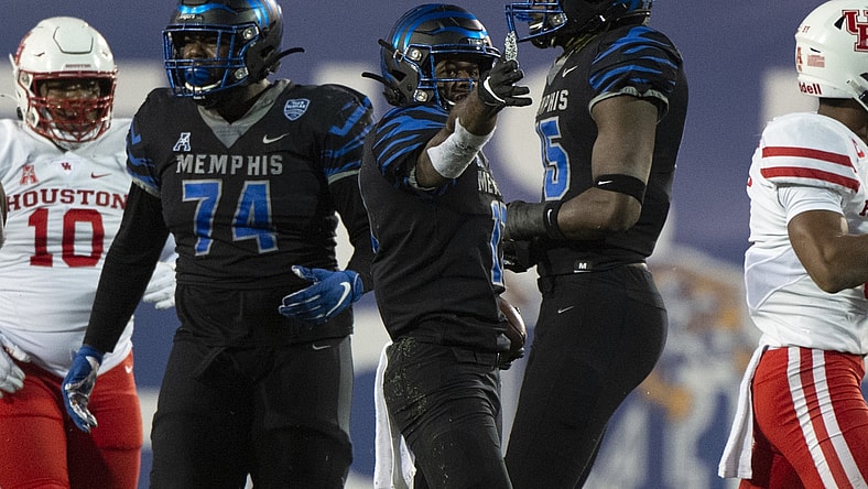 Dec 12, 2020; Memphis, Tennessee, USA; Memphis Tigers running back Kylan Watkins (17) celebrates during the second half against the Houston Cougars at Liberty Bowl Memorial Stadium. Mandatory Credit: Justin Ford-USA TODAY Sports