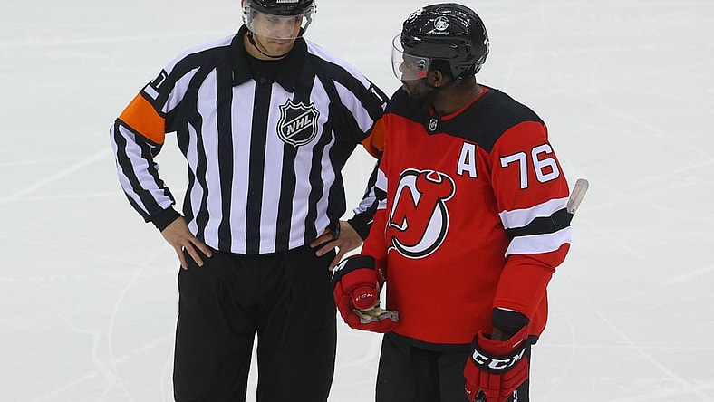 Apr 9, 2021; Newark, New Jersey, USA; referee Frederick L'Ecuyer (17) and New Jersey Devils defenseman P.K. Subban (76) talk during the first period at Prudential Center. Mandatory Credit: Ed Mulholland-USA TODAY Sports