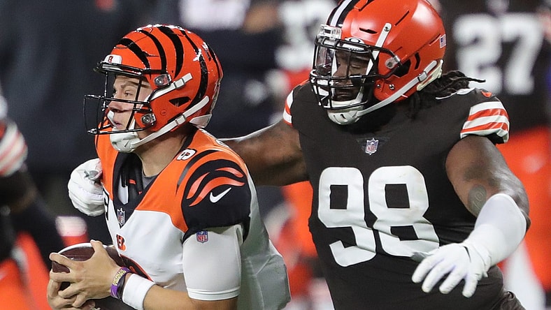 Cleveland Browns defensive tackle Sheldon Richardson (98) sacks Cincinnati Bengals quarterback Joe Burrow (9) during the first half of an NFL football game at FirstEnergy Stadium, Thursday, Sept. 17, 2020, in Cleveland, Ohio. [Jeff Lange/Beacon Journal]

Browns 23