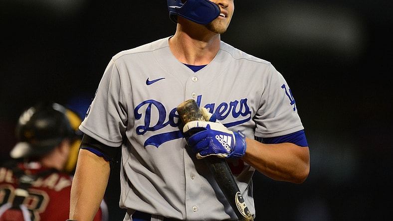 Aug 1, 2021; Phoenix, Arizona, USA; Los Angeles Dodgers shortstop Corey Seager (5) reacts after striking out against the Arizona Diamondbacks during the first inning at Chase Field. Mandatory Credit: Gary A. Vasquez-USA TODAY Sports