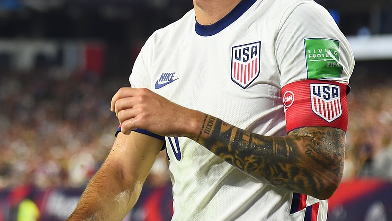 Sep 5, 2021; Nashville, Tennessee, USA; United States star Christian Pulisic (10) on a corner kick against Canada during a CONCACAF FIFA World Cup Qualifier soccer match at Nissan Stadium. Mandatory Credit: Christopher Hanewinckel-USA TODAY Sports