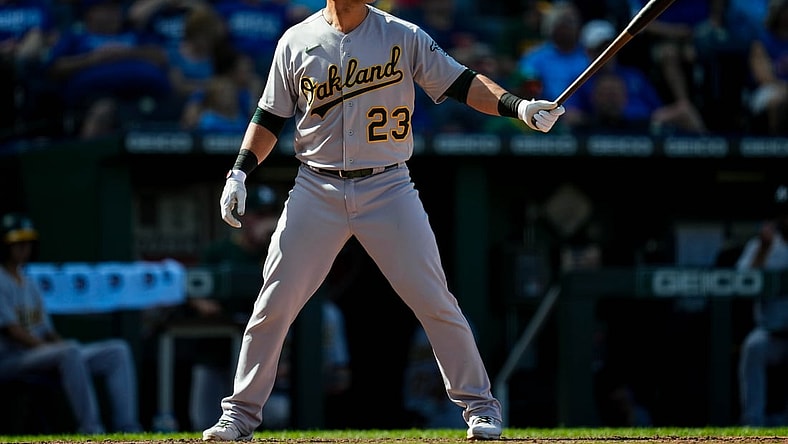 Sep 16, 2021; Kansas City, Missouri, USA; Oakland Athletics catcher Yan Gomes (23) bats against the Kansas City Royals during the eighth inning at Kauffman Stadium. Mandatory Credit: Jay Biggerstaff-USA TODAY Sports