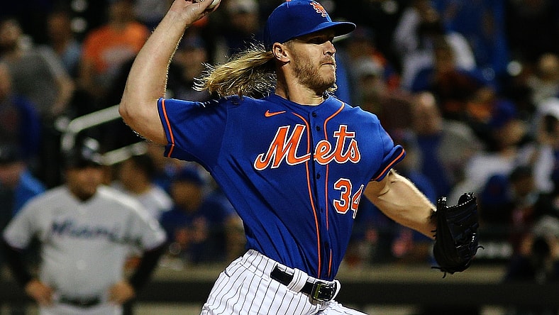 Sep 28, 2021; New York City, New York, USA; New York Mets starting pitcher Noah Syndergaard (34) delivers against the Miami Marlins during the first inning of game two of a doubleheader at Citi Field. Mandatory Credit: Andy Marlin-USA TODAY Sports