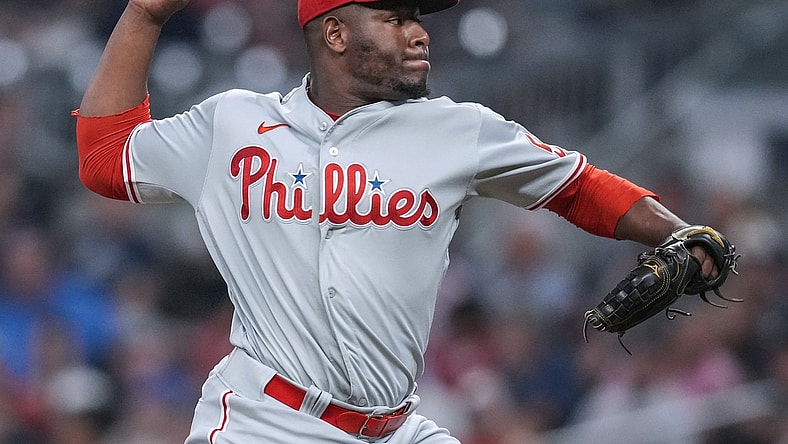 Sep 28, 2021; Cumberland, Georgia, USA; Philadelphia Phillies relief pitcher Hector Neris (50) pitches against the Atlanta Braves during the eighth inning at Truist Park. Mandatory Credit: Dale Zanine-USA TODAY Sports