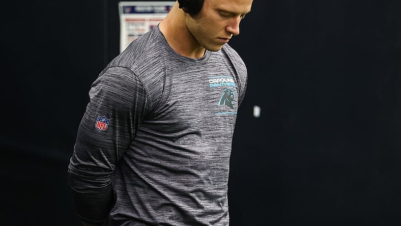 Sep 23, 2021; Houston, Texas, USA; Carolina Panthers running back Christian McCaffrey (22) prepares to walk onto the field before the game against the Houston Texans at NRG Stadium. Mandatory Credit: Troy Taormina-USA TODAY Sports