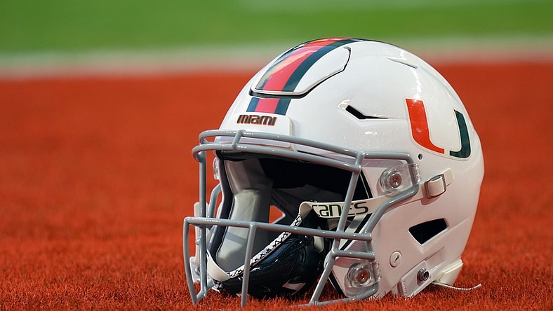 Sep 30, 2021; Miami Gardens, Florida, USA; A general view of a Miami Hurricanes helmet in the end zone prior to the game between the Miami Hurricanes and the Virginia Cavaliers at Hard Rock Stadium. Mandatory Credit: Jasen Vinlove-USA TODAY Sports