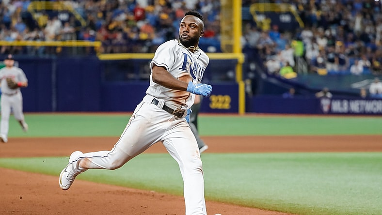 Oct 7, 2021; St. Petersburg, Florida, USA; Tampa Bay Rays left fielder Randy Arozarena (56) runs to third base in the seventh inning against the Boston Red Sox during game one of the 2021 ALDS at Tropicana Field. Mandatory Credit: Mike Watters-USA TODAY Sports