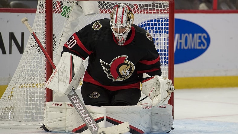 Oct 23, 2021; Ottawa, Ontario, CAN; Ottawa Senators goalie Matt Murray (30) makes a save in the first period against the New York Rangers at the Canadian Tire Centre. Mandatory Credit: Marc DesRosiers-USA TODAY Sports