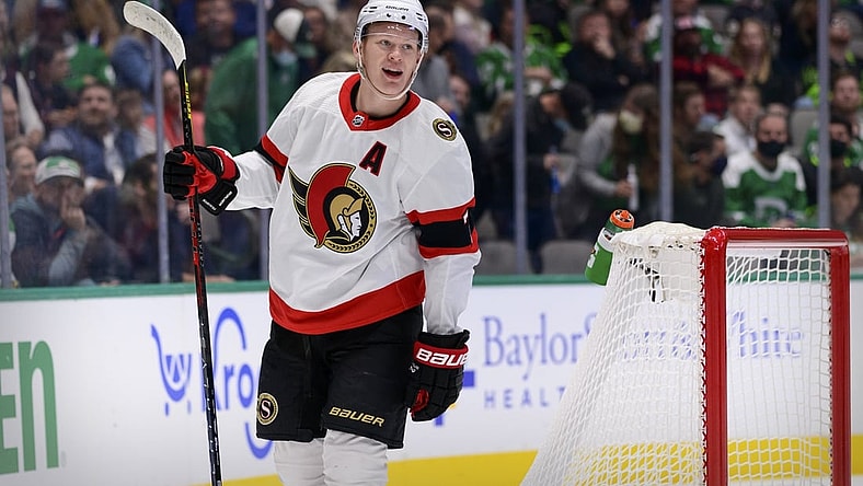 Oct 29, 2021; Dallas, Texas, USA; Ottawa Senators left wing Brady Tkachuk (7) celebrates a goal scored by center Josh Norris (not pictured) against the Dallas Stars during the first period at the American Airlines Center. Mandatory Credit: Jerome Miron-USA TODAY Sports