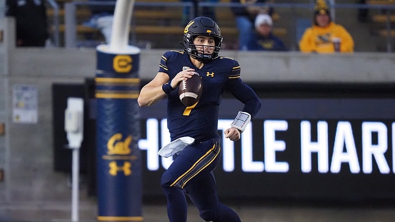 Oct 30, 2021; Berkeley, California, USA; California Golden Bears quarterback Chase Garbers (7) scrambles during the third quarter against the Oregon State Beavers at FTX Field at California Memorial Stadium. Mandatory Credit: Kelley L Cox-USA TODAY Sports