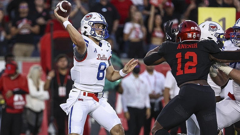 Oct 30, 2021; Houston, Texas, USA; Southern Methodist Mustangs quarterback Tanner Mordecai (8) attempts a pass during the first quarter against the Houston Cougars at TDECU Stadium. Mandatory Credit: Troy Taormina-USA TODAY Sports