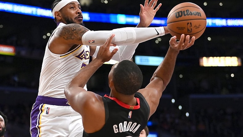 Oct 31, 2021; Los Angeles, California, USA;  Houston Rockets guard Eric Gordon (10) is fouled by Los Angeles Lakers forward Carmelo Anthony (7) in the first half at Staples Center. Mandatory Credit: Jayne Kamin-Oncea-USA TODAY Sports