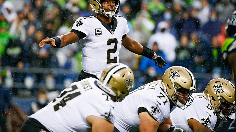 Oct 25, 2021; Seattle, Washington, USA; New Orleans Saints quarterback Jameis Winston (2) stands over center against the Seattle Seahawks during the second quarter at Lumen Field. Mandatory Credit: Joe Nicholson-USA TODAY Sports