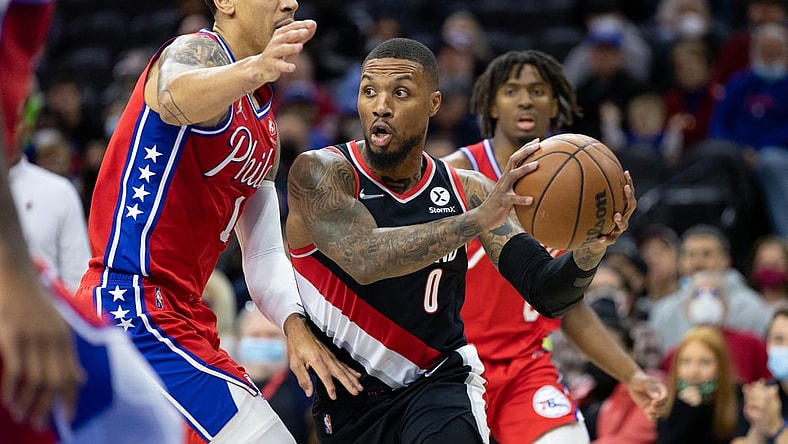 Nov 1, 2021; Philadelphia, Pennsylvania, USA; Portland Trail Blazers guard Damian Lillard (0) drives against Philadelphia 76ers forward Danny Green (14) during the first quarter at Wells Fargo Center. Mandatory Credit: Bill Streicher-USA TODAY Sports