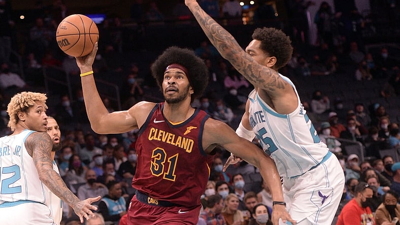 Nov 1, 2021; Charlotte, North Carolina, USA;  Cleveland Cavaliers center Jarrett Allen (31) moves past Charlotte Hornets forward PJ Washington (25) during the first half at the Spectrum Center. Mandatory Credit: Sam Sharpe-USA TODAY Sports