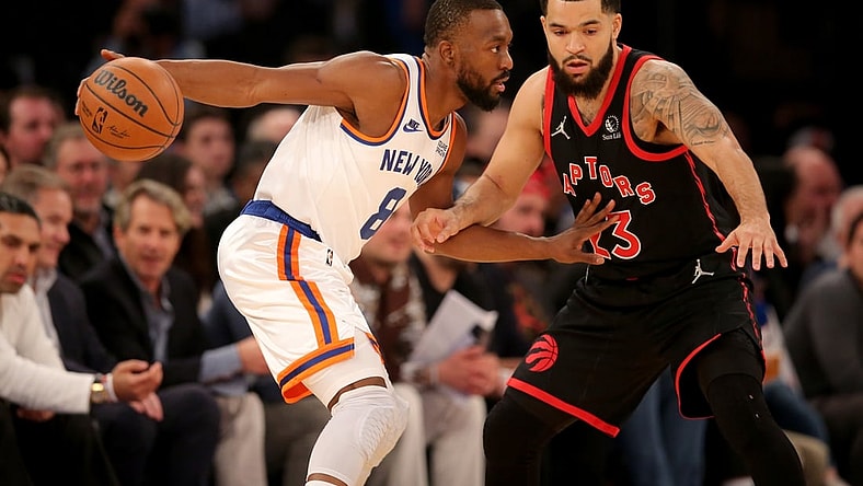 Nov 1, 2021; New York, New York, USA; New York Knicks guard Kemba Walker (8) controls the ball against Toronto Raptors guard Fred VanVleet (23) during the first quarter at Madison Square Garden. Mandatory Credit: Brad Penner-USA TODAY Sports