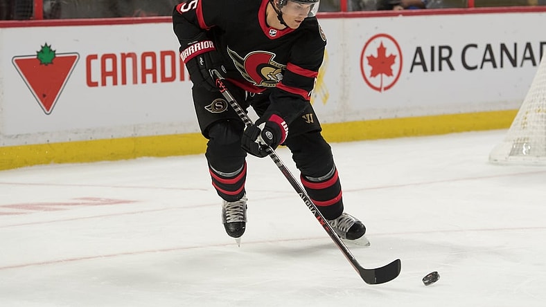 Nov 4, 2021; Ottawa, Ontario, CAN; Ottawa Senators defenseman Nick Holden (5) skates with the puck in the first period against the Vegas Golden Knights at the Canadian Tire Centre. Mandatory Credit: Marc DesRosiers-USA TODAY Sports