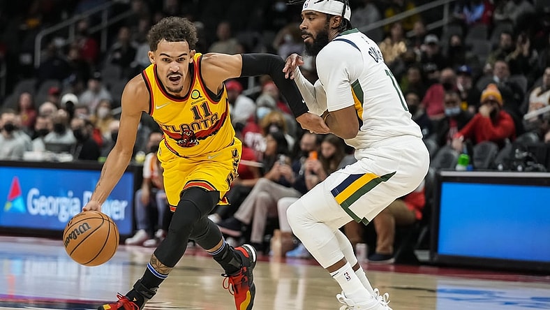 Nov 4, 2021; Atlanta, Georgia, USA; Atlanta Hawks guard Trae Young (11) works to get past Utah Jazz guard Mike Conley (11) during the first half at State Farm Arena. Mandatory Credit: Dale Zanine-USA TODAY Sports