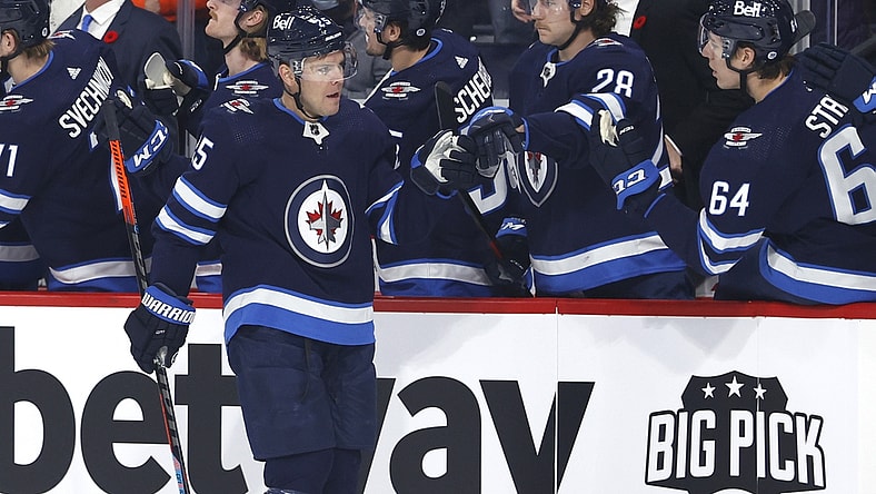 Nov 5, 2021; Winnipeg, Manitoba, CAN;  Winnipeg Jets center Paul Stastny (25) celebrates his first period goal against the Chicago Blackhawks at Canada Life Centre. Mandatory Credit: James Carey Lauder-USA TODAY Sports