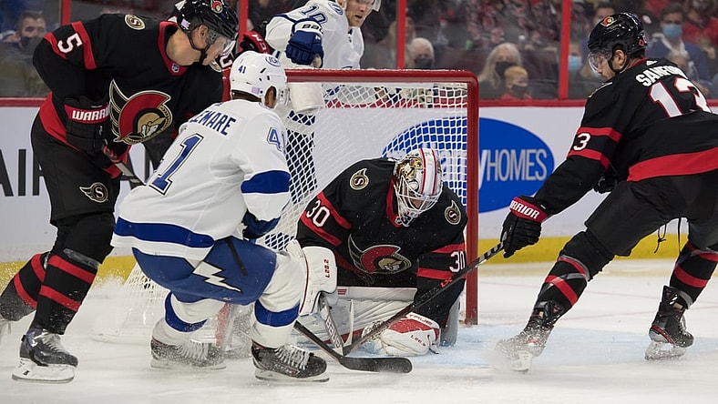 Nov 6, 2021; Ottawa, Ontario, CAN; Ottawa Senators goalie Matt Murray (30) makes a save in front of Tampa Bay Lightning left wing Pierre-Edouard Bellemare (41) in the first period at the Canadian Tire Centre. Mandatory Credit: Marc DesRosiers-USA TODAY Sports