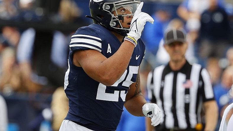 Nov 6, 2021; Provo, Utah, USA; Brigham Young Cougars running back Tyler Allgeier (25) reacts after his first quarter touchdown against the Idaho State Bengals at LaVell Edwards Stadium. Mandatory Credit: Jeffrey Swinger-USA TODAY Sports