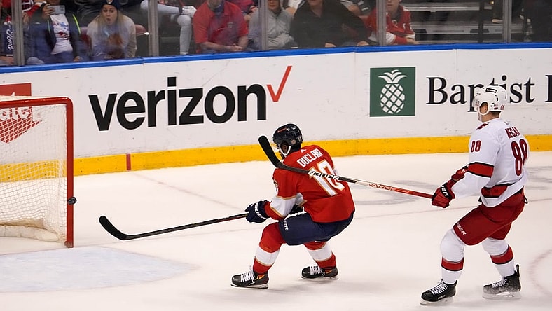 Nov 6, 2021; Sunrise, Florida, USA; Florida Panthers left wing Anthony Duclair (10) scores and empty net goal in front of Carolina Hurricanes center Martin Necas (88) during the third period at FLA Live Arena. Mandatory Credit: Jasen Vinlove-USA TODAY Sports