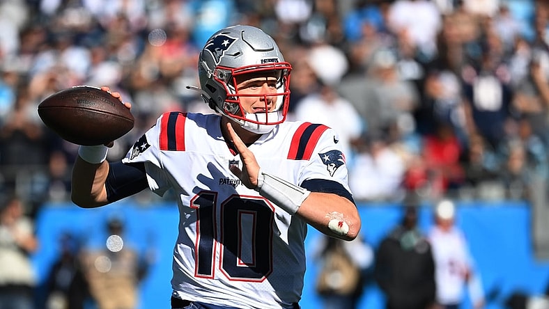 Nov 7, 2021; Charlotte, North Carolina, USA;  New England Patriots quarterback Mac Jones (10) looks to pass in the first quarter at Bank of America Stadium. Mandatory Credit: Bob Donnan-USA TODAY Sports