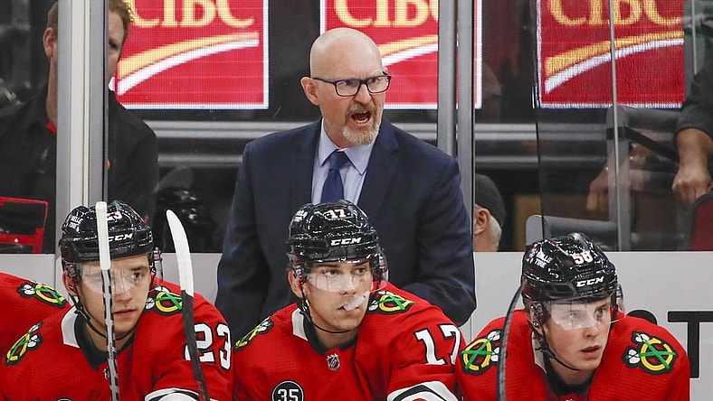 Nov 7, 2021; Chicago, Illinois, USA; Chicago Blackhawks interim head coach Derek King yells to his team during the first period of an NHL game against the Nashville Predators at United Center. Mandatory Credit: Kamil Krzaczynski-USA TODAY Sports