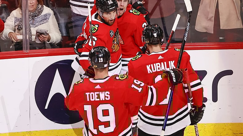 Nov 7, 2021; Chicago, Illinois, USA; Chicago Blackhawks left wing Brandon Hagel (38) celebrates with teammates after scoring against the Nashville Predators during the second period at United Center. Mandatory Credit: Kamil Krzaczynski-USA TODAY Sports