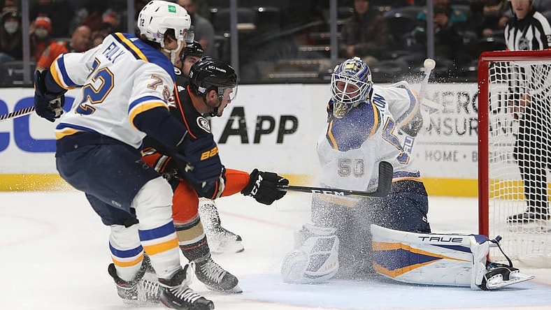 Nov 7, 2021; Anaheim, California, USA; Anaheim Ducks center Sam Carrick (39) scores a goal against St. Louis Blues goalie Jordan Binnington (50) during the second period at Honda Center. Mandatory Credit: Kiyoshi Mio-USA TODAY Sports