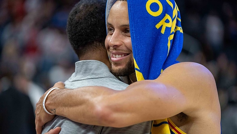 Nov 7, 2021; San Francisco, California, USA;  after the game Golden State Warriors guard Stephen Curry (30) hugs Houston Rockets head coach Stephen Silastt at Chase Center. Mandatory Credit: Neville E. Guard-USA TODAY Sports