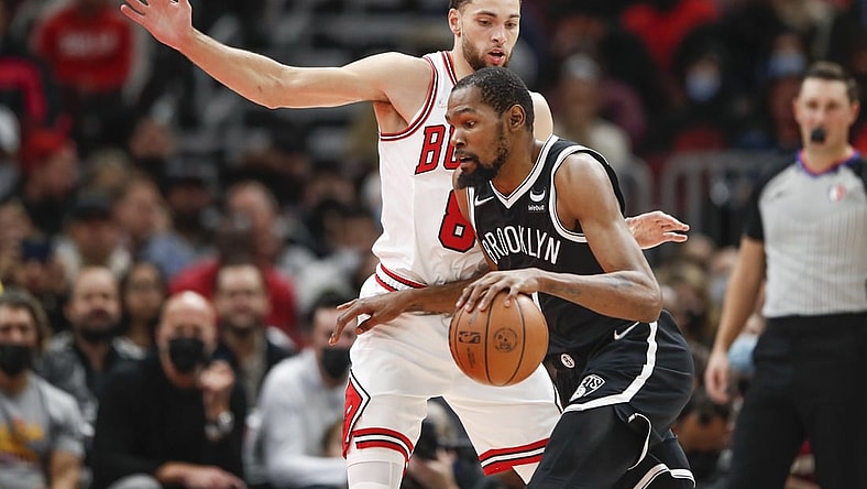 Nov 8, 2021; Chicago, Illinois, USA; Chicago Bulls guard Zach LaVine (8) defends against Brooklyn Nets forward Kevin Durant (7) during the first half at United Center. Mandatory Credit: Kamil Krzaczynski-USA TODAY Sports
