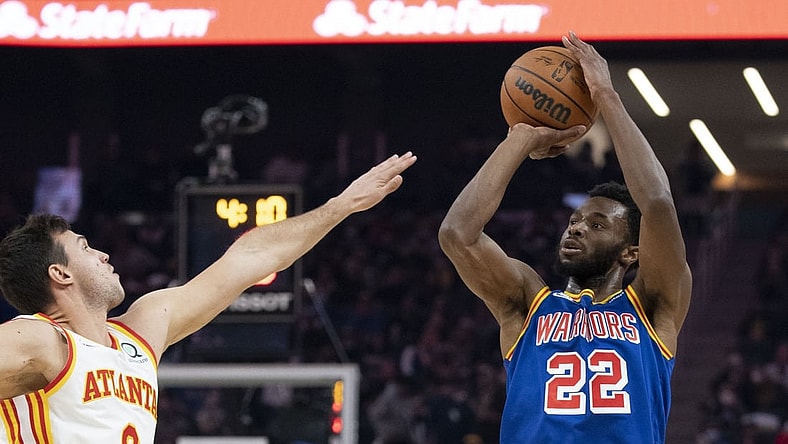 November 8, 2021; San Francisco, California, USA; Golden State Warriors forward Andrew Wiggins (22) shoots the basketball against Atlanta Hawks forward Danilo Gallinari (8) during the first quarter at Chase Center. Mandatory Credit: Kyle Terada-USA TODAY Sports